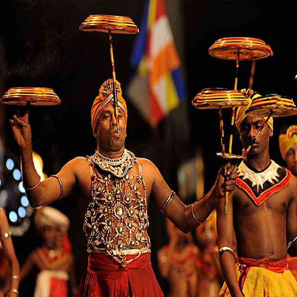 Local hand drummer at the Kandy Perahera festival, one of the top places to visit in Kandy during summer.