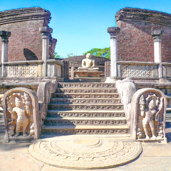 Intricate moonstone carvings at the entrance of the circular Vatadage relic house in Polonnaruwa, Sri Lanka.