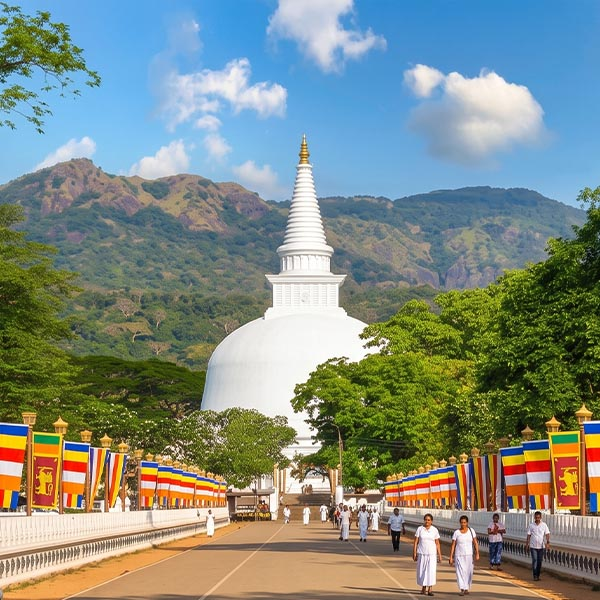  Pilgrims visiting the white stupa at Mahiyangana Raja Maha Vihara, revered as the sacred site of the Buddha's first visit to Sri Lanka.