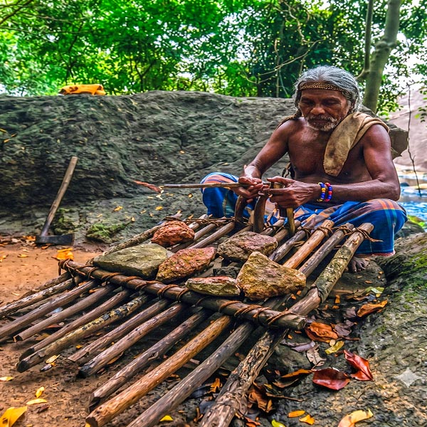 Ancient Vedda hunting weapons and traditional crafts showcased at the Rathugala Museum.