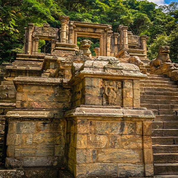 Ornate stone staircase and carved lion statues at the Yapahuwa Rock Fortress in Sri Lanka.