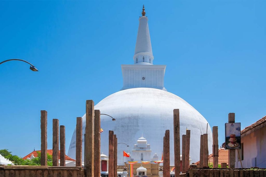 Anuradhapura ancient ruins and white stupa under a blue sky during a 10-day Sri Lanka tour